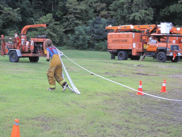 Christina Barbour stretches hoseline in preparation of cone drill 8/11/2010